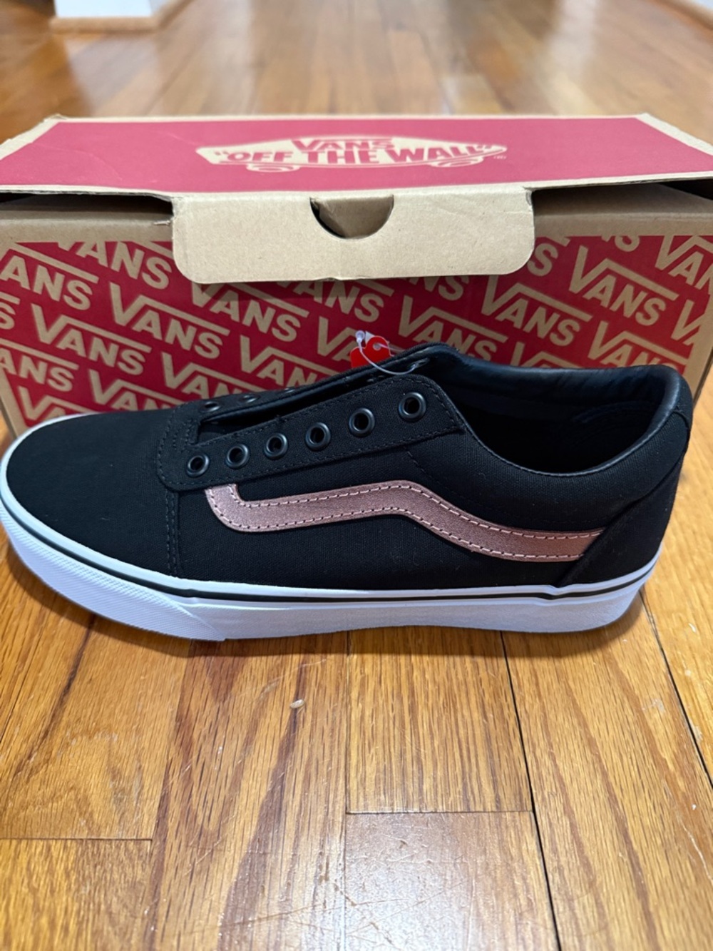 Vans Black Low-Top Sneaker with Metallic Pink Side Stripe